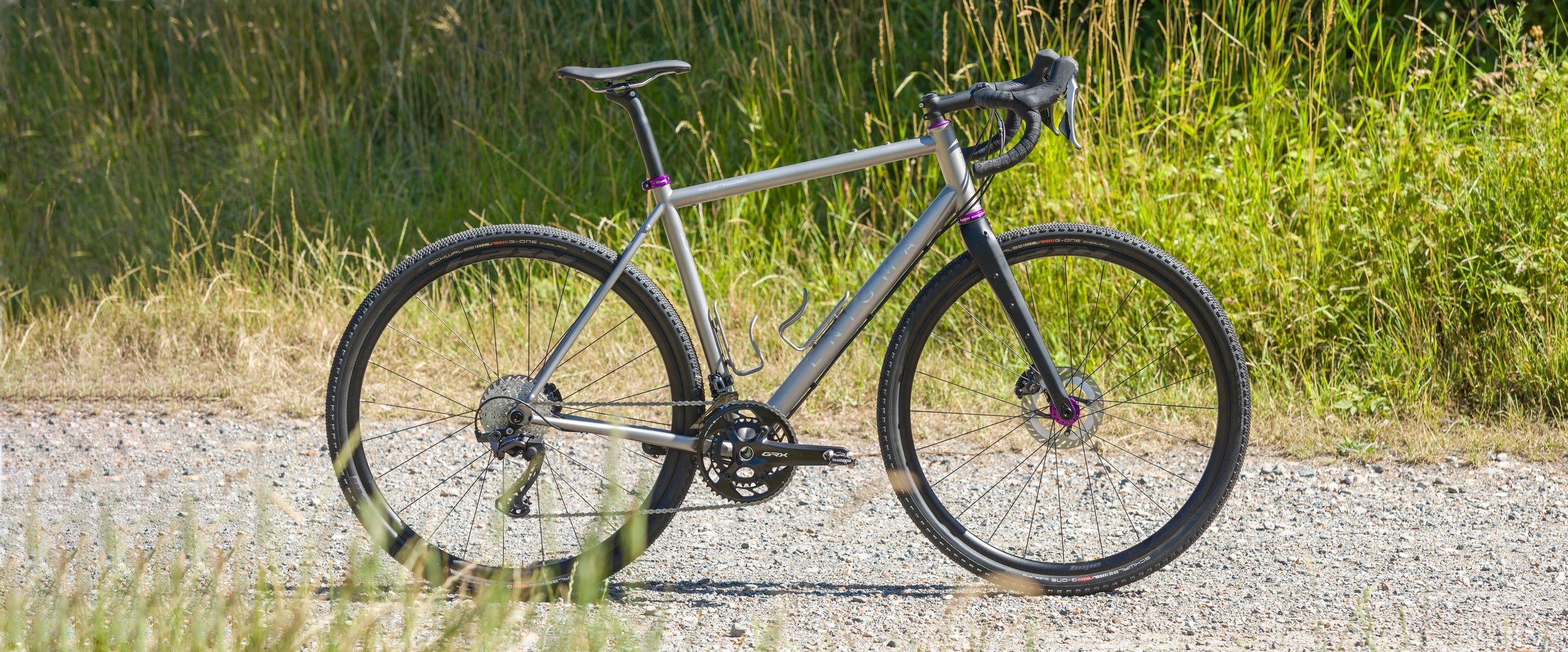 Enigma Escape titanium gravel bike designed for adventure, versatility, and all-terrain performance