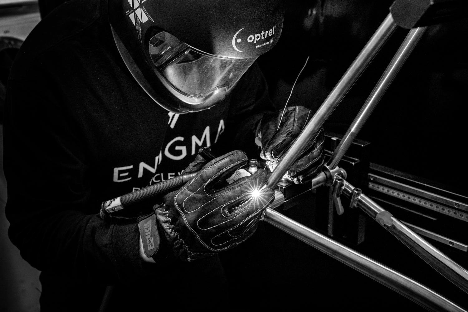 Custom titanium bicycle frame modification by an Enigma frame builder