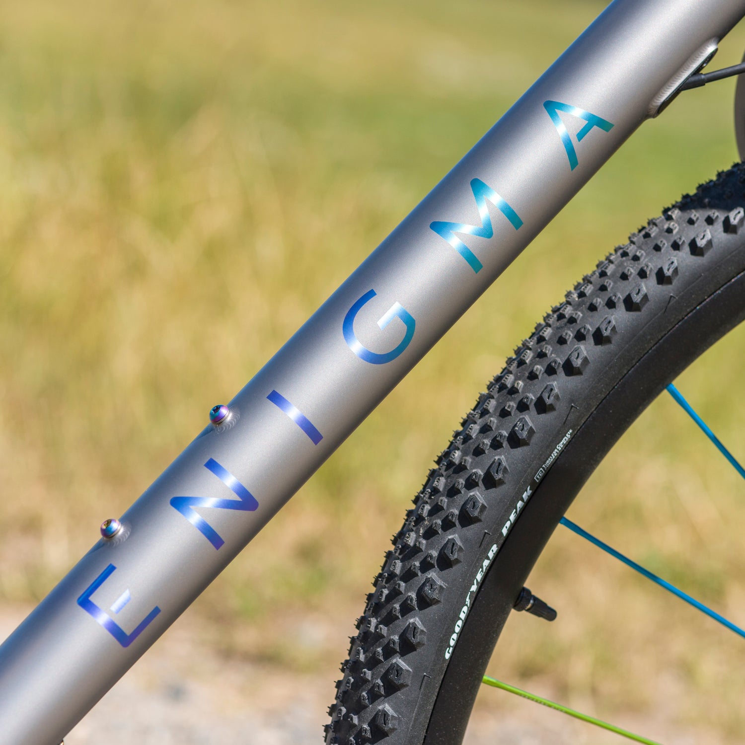ENIGMA anodised logo fading from blue to turquoise