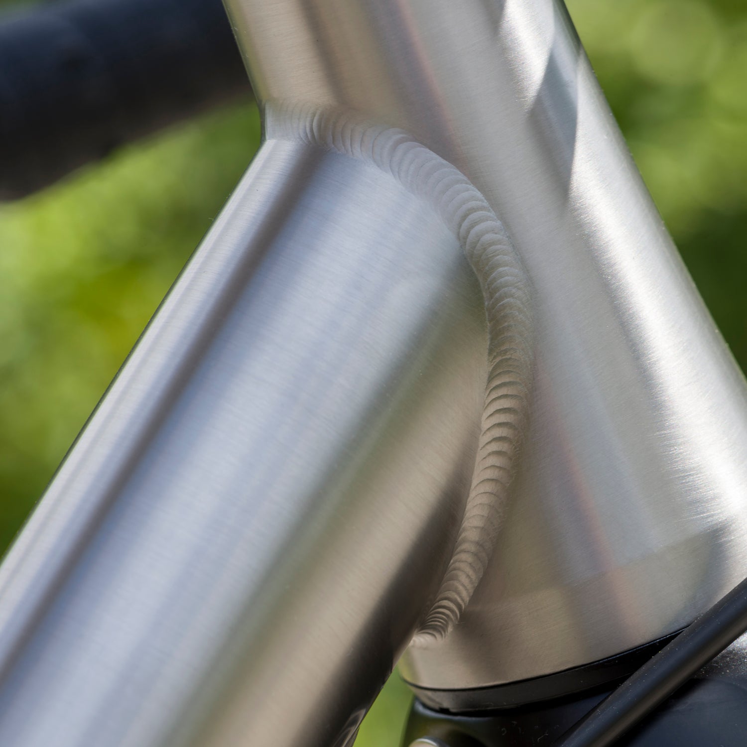 Close up of a beautiful tig weld on the Enigma Elan titanium road bike