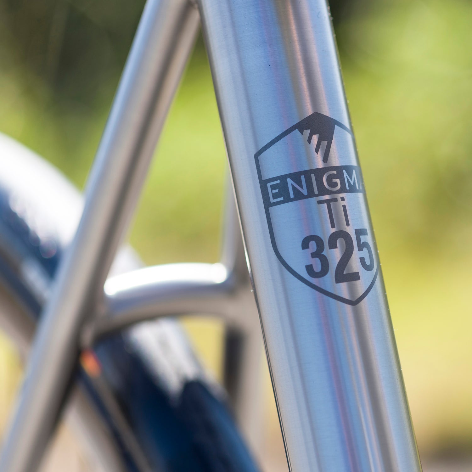 Close up of the Tubing badge on the Enigma Elan Titanium frame, built in Sussex, UK