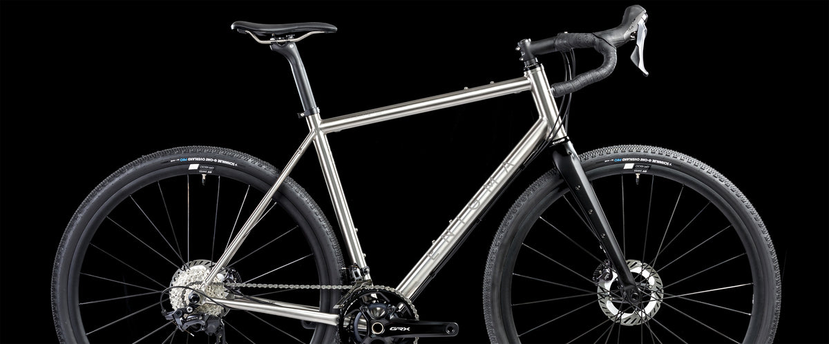 Enigma Escape titanium gravel bike designed for adventure, versatility, and all-terrain performance