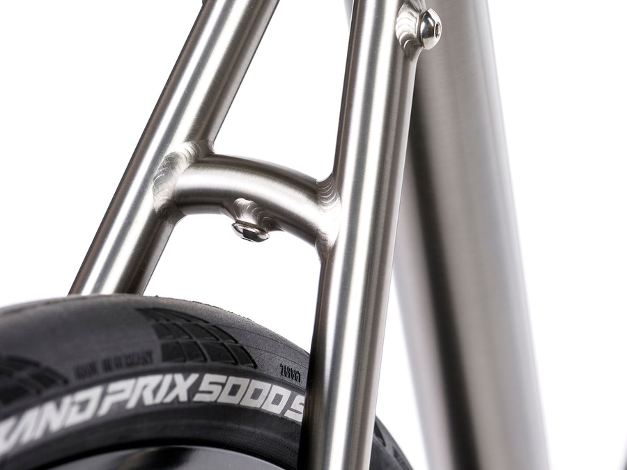 Enigma Etape titanium all-road bike showing clearance for tyres up to 35mm
